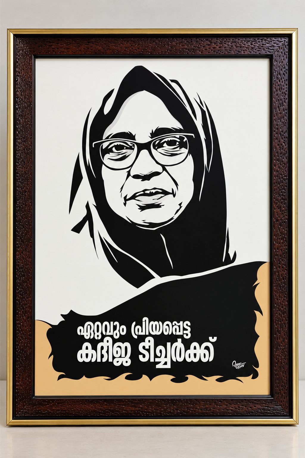 Framed paper-cut portrait tribute to a teacher wearing glasses and a headscarf