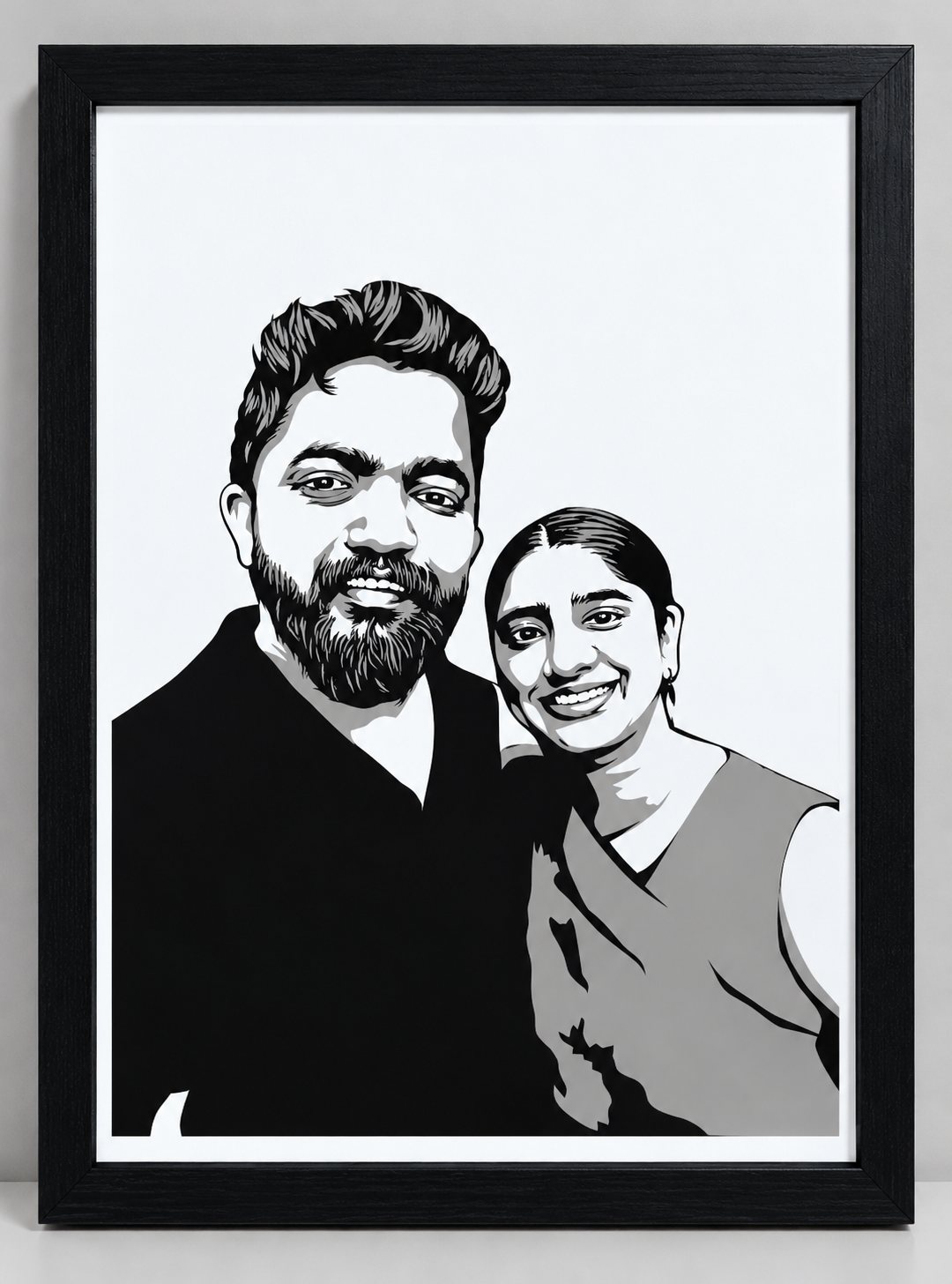 Framed paper-cut portrait of a smiling couple