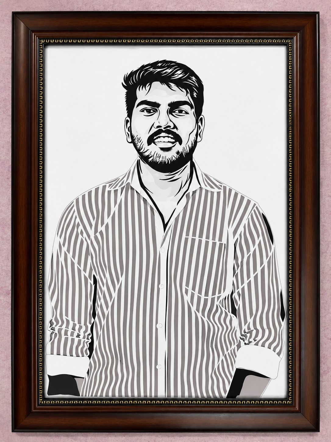 Framed paper-cut portrait of a smiling young man in a striped shirt